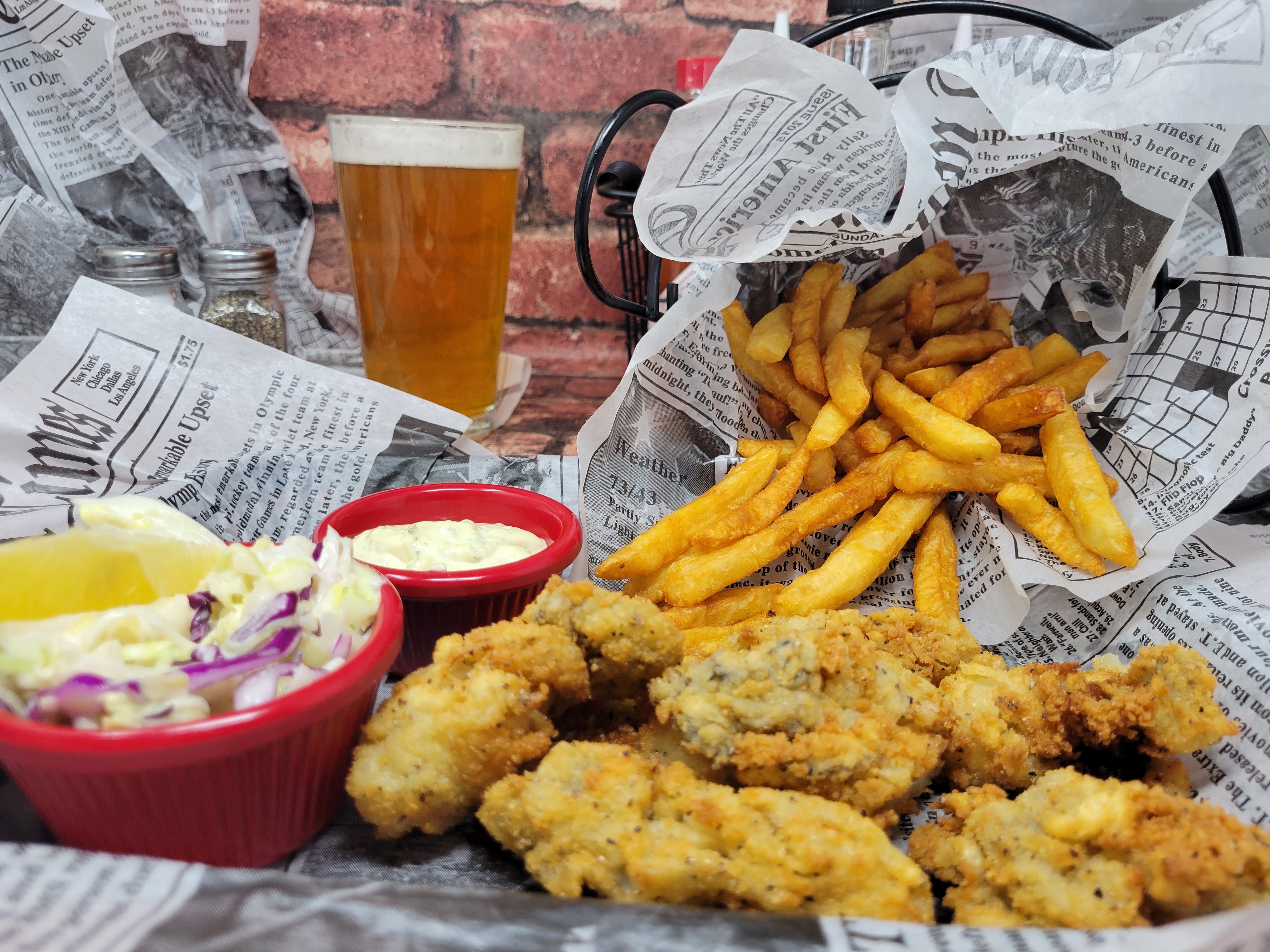 a plate full of food sitting on a table